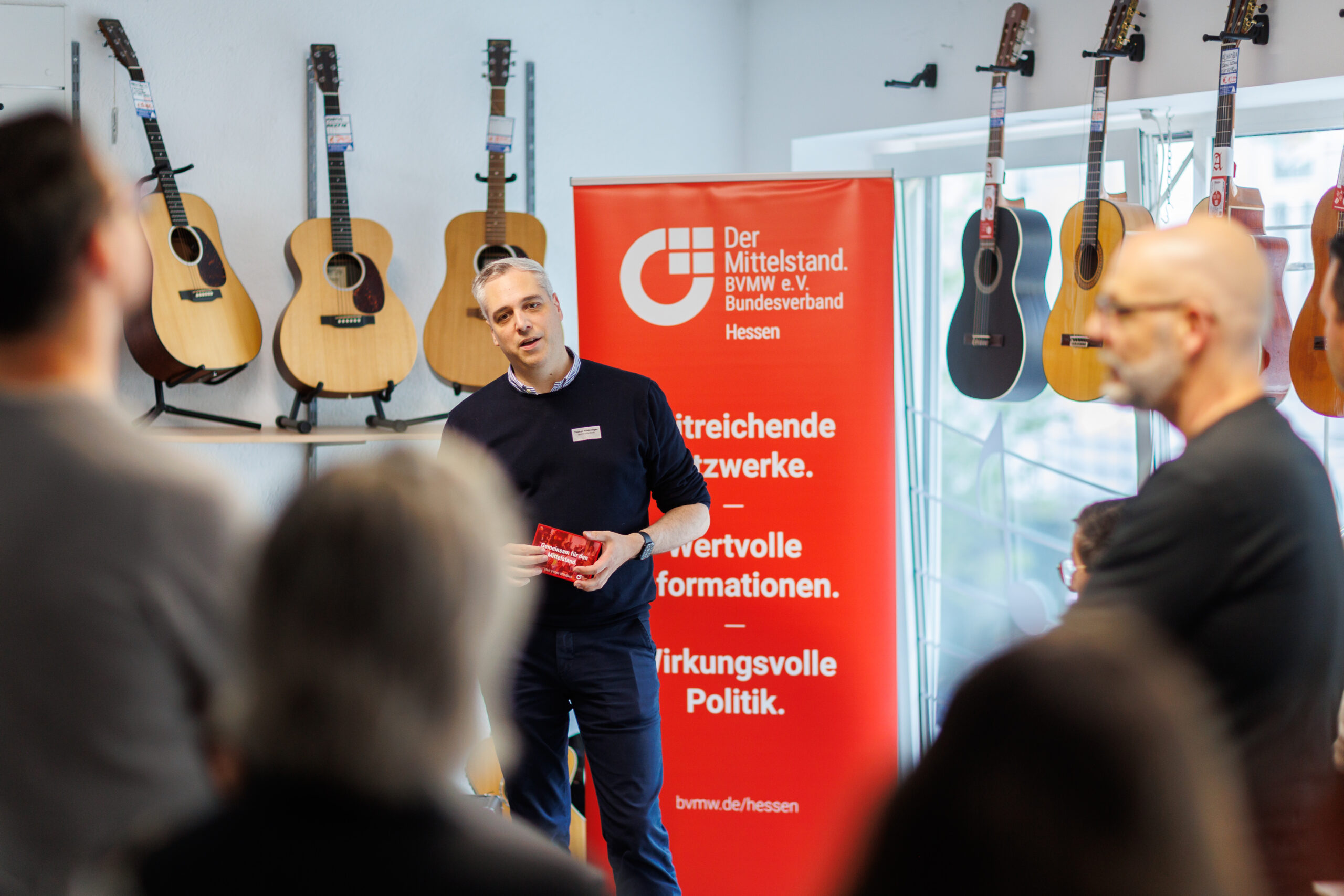 Thomas Krüdewagen beim BVMW Networking Abend im Musikhaus André in Offenbach am Main